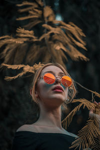 Portrait of young woman outdoors