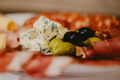 Close-up of serving fruit salad in plate