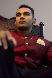 Portrait of young man looking away