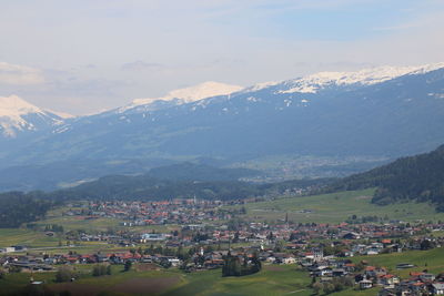 High angle view of townscape against mountains