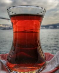 Close-up of red wine glass