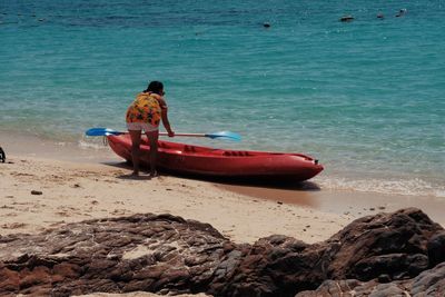 Boat moored on shore