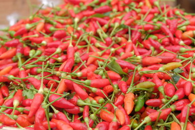 Close-up of red chili peppers for sale in market