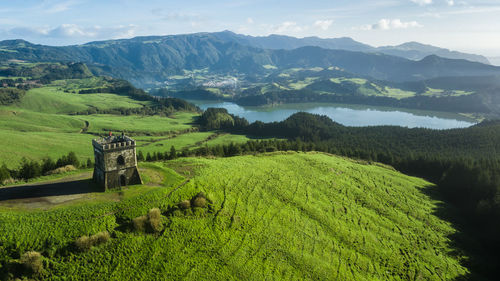 Aerial view of castelo branco historic castle with furnas lagoon on background in sao miguel, azores