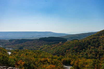 Scenic view of landscape against clear sky during autumn