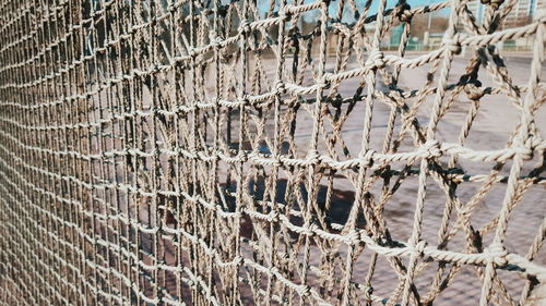 Full frame shot of sport net on sunny day