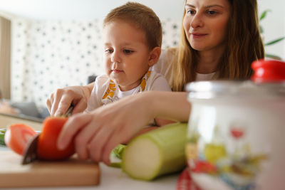 Portrait of woman preparing food