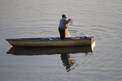 Man on boat in water