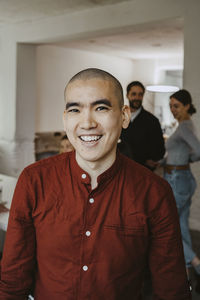 Portrait of happy male entrepreneur in startup company