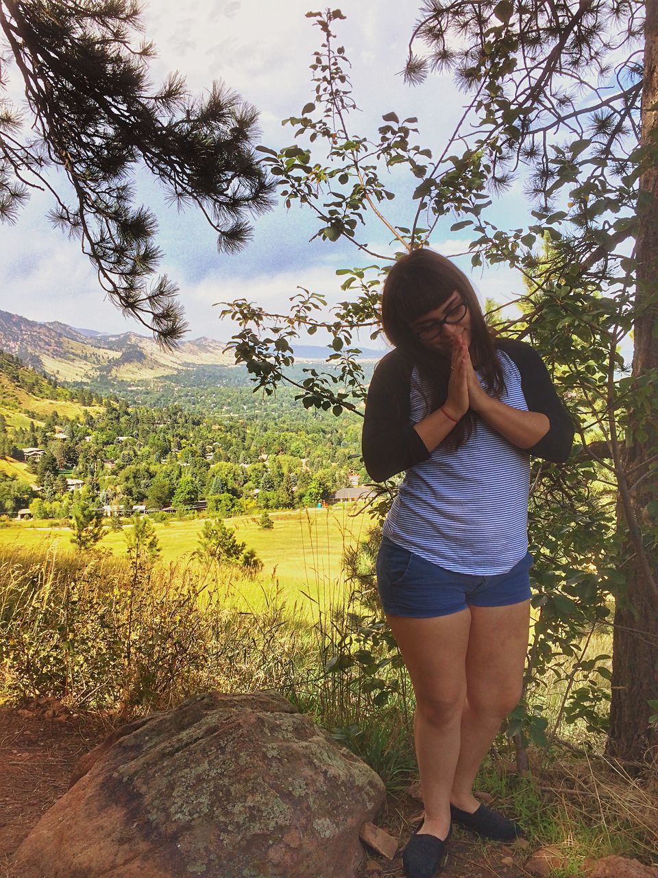 young adult, lifestyles, casual clothing, leisure activity, young women, tree, standing, sky, person, field, three quarter length, full length, long hair, landscape, nature, tranquility, tranquil scene, rear view