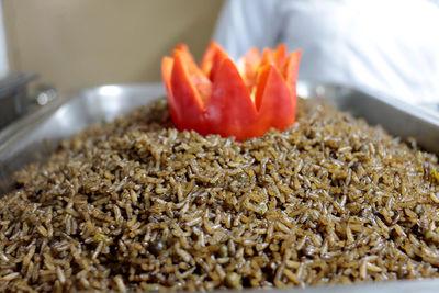 Close-up of chopped fruits in plate on table