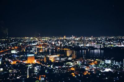 Illuminated cityscape at night