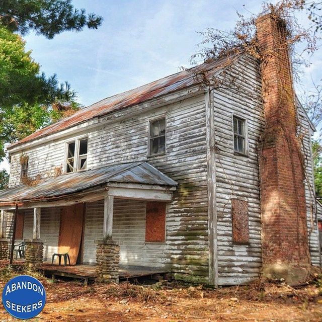 architecture, building exterior, built structure, window, house, tree, sky, residential structure, door, old, residential building, low angle view, day, closed, facade, outdoors, exterior, no people, wood - material, building