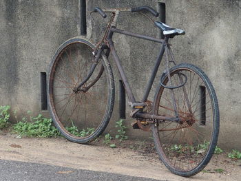 Bicycle parked at roadside