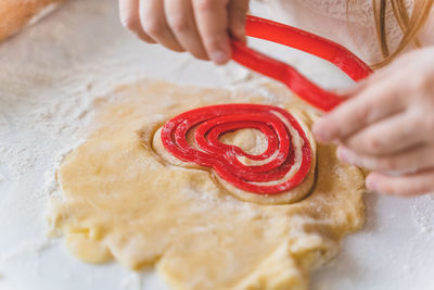 Midsection of woman preparing food