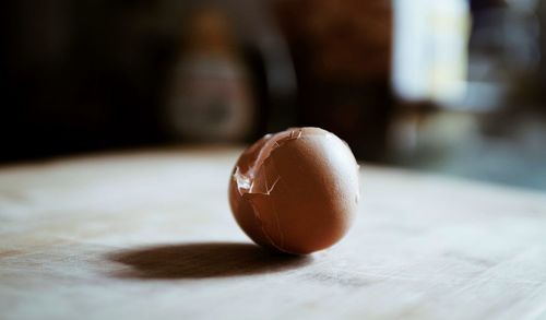 Close-up of broken eggshell on table