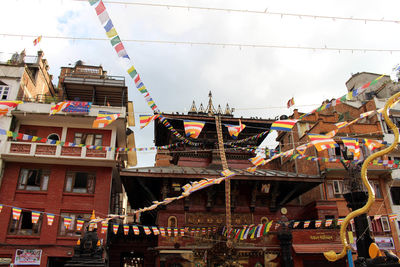 Low angle view of buildings against sky