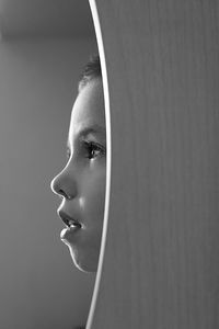 Close-up of boy looking away