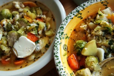 High angle view of vegetable soup  in plate on table