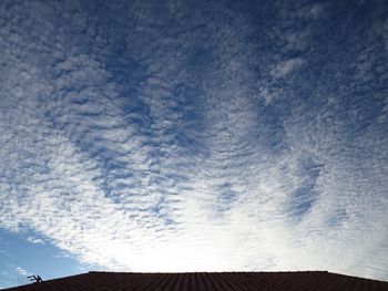 Low angle view of roof against sky