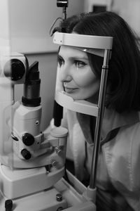 Midsection of woman working in laboratory