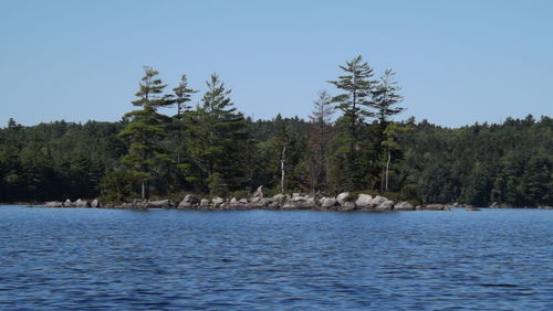 Scenic view of calm sea against clear sky