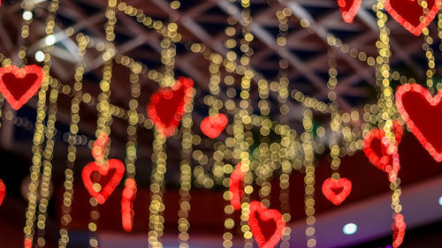 Close-up of christmas decoration hanging at night