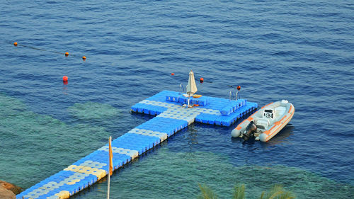 High angle view of nautical vessel moored on sea