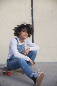 A young woman on a skateboard