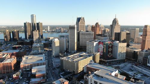 High angle view of city buildings against sky