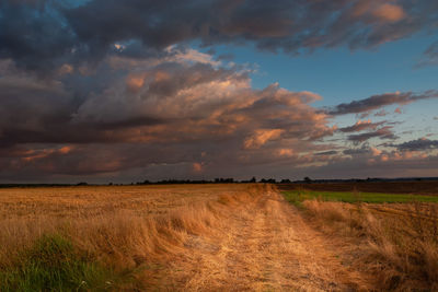 Beautiful clouds during sunset over the fields in eastern poland