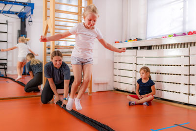 Jumping over rope in a physical activity class