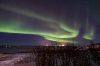 Scenic view of aurora borealis over iceland