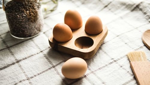 High angle view of eggs on table