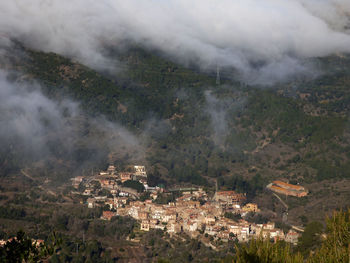 Aerial view of storm clouds over mountains