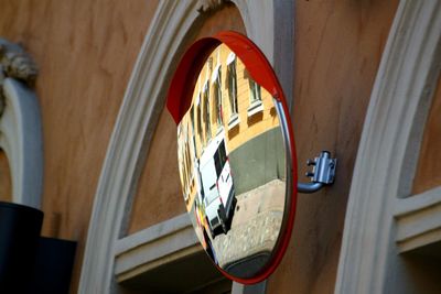 Low angle view of clothes hanging on wall