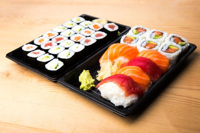 Close-up of sushi served on table