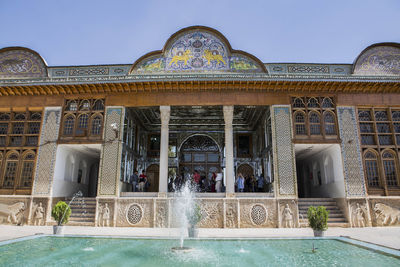 Fountain in front of building