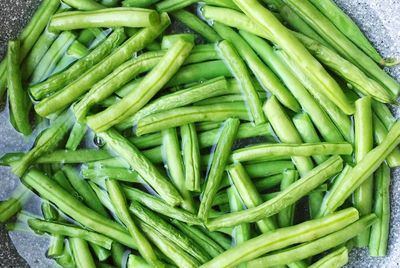 Directly above shot of beans in water and bowl