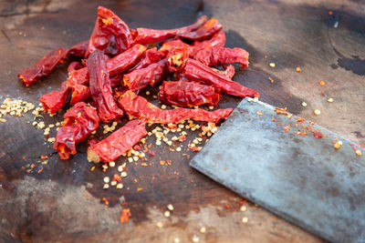 High angle view of red chili pepper on table