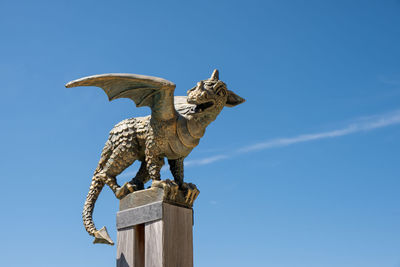 Low angle view of statue against clear sky