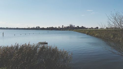 Scenic view of river against sky