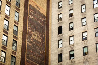 An old building surface with windows in manhattan, new york city.