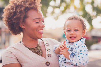 Portrait of happy mother and daughter