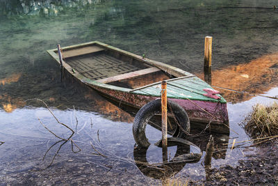 An old sunken wooden boat
