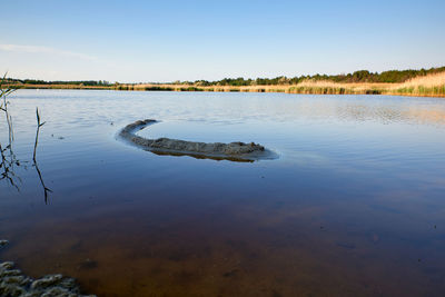 Scenic view of lake against sky