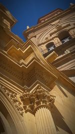 Low angle view of temple building against sky