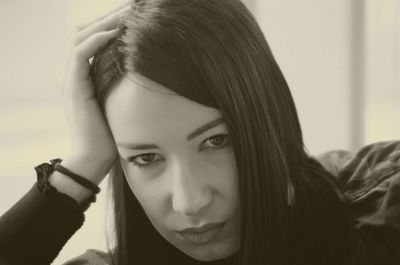 Close-up portrait of young woman