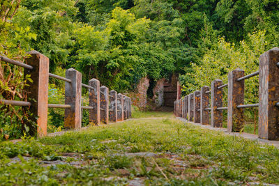 View of wooden gate on landscape