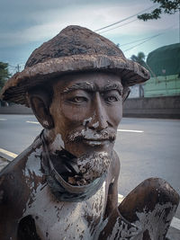 Close-up of statue against sky